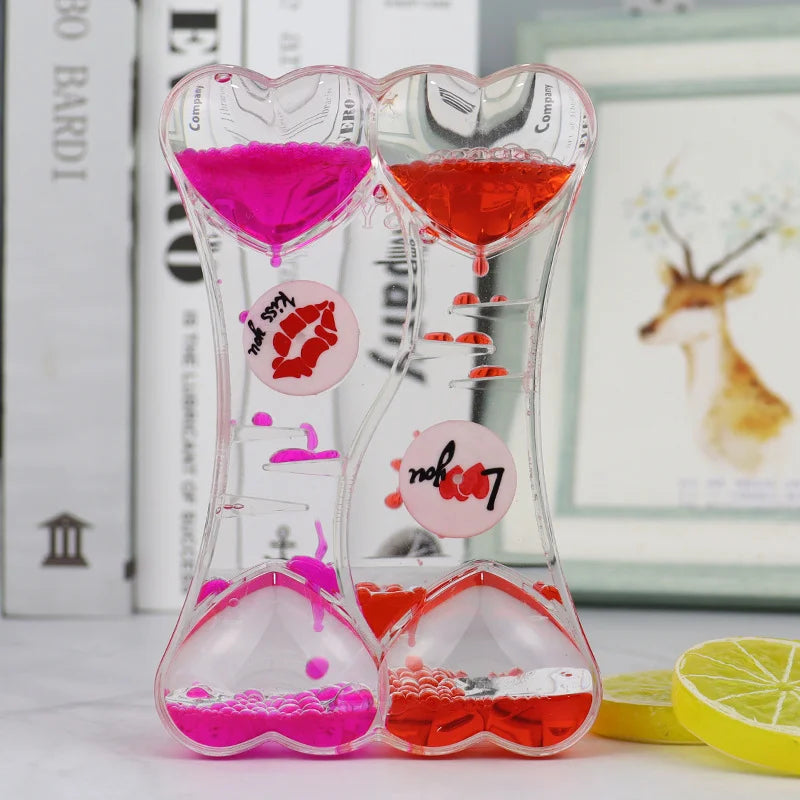 minuteur sablier liquide bicolore transparent motifs géométriques souriant deco moderne