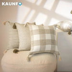 Housse de coussin lin crème 45x45 cm sur canapé