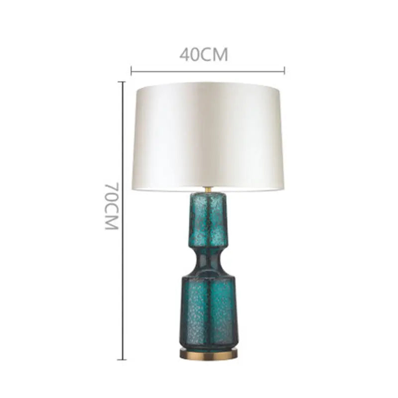 lampe table verre bleu turquoise moderne abat jour opaque pied doré élégante contemporaine led