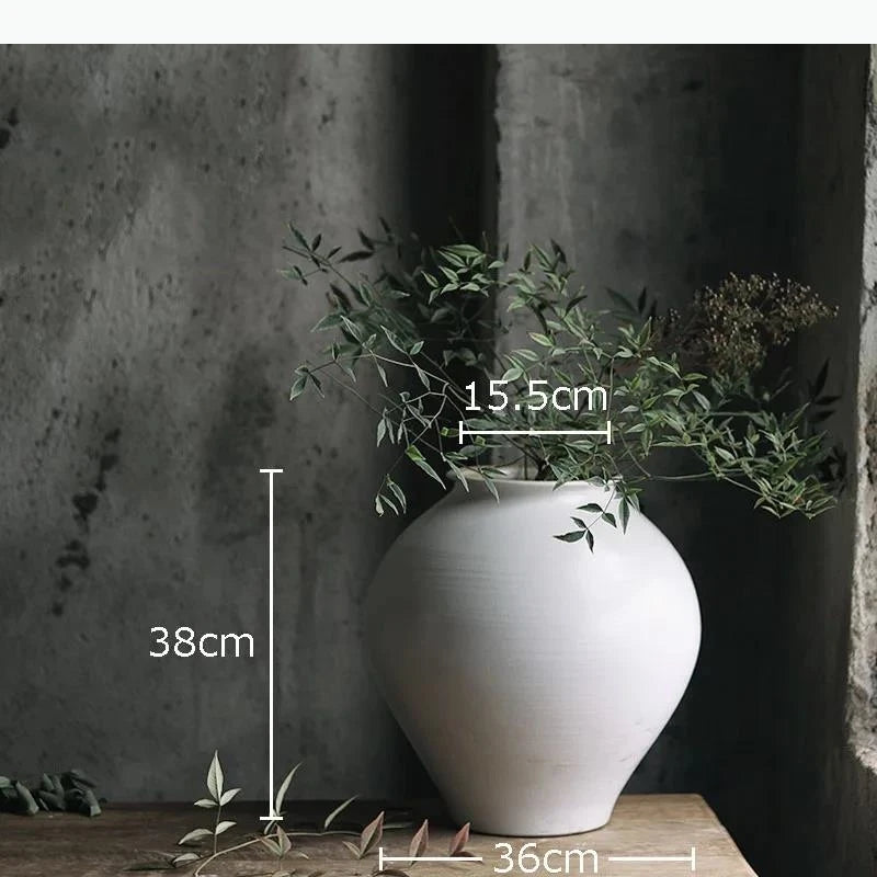 vases blancs modernes texture mat opaques décoration intérieure arrangement fleurs table