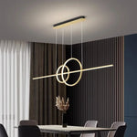 suspension lumineuse moderne or noir minimaliste câbles suspendus panneaux texturés