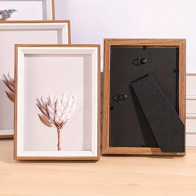 Cadre photo en bois naturel 18x24 sur mur blanc