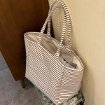 sac main blanc noir rayures horizontales poignées détachables intérieur beige casual