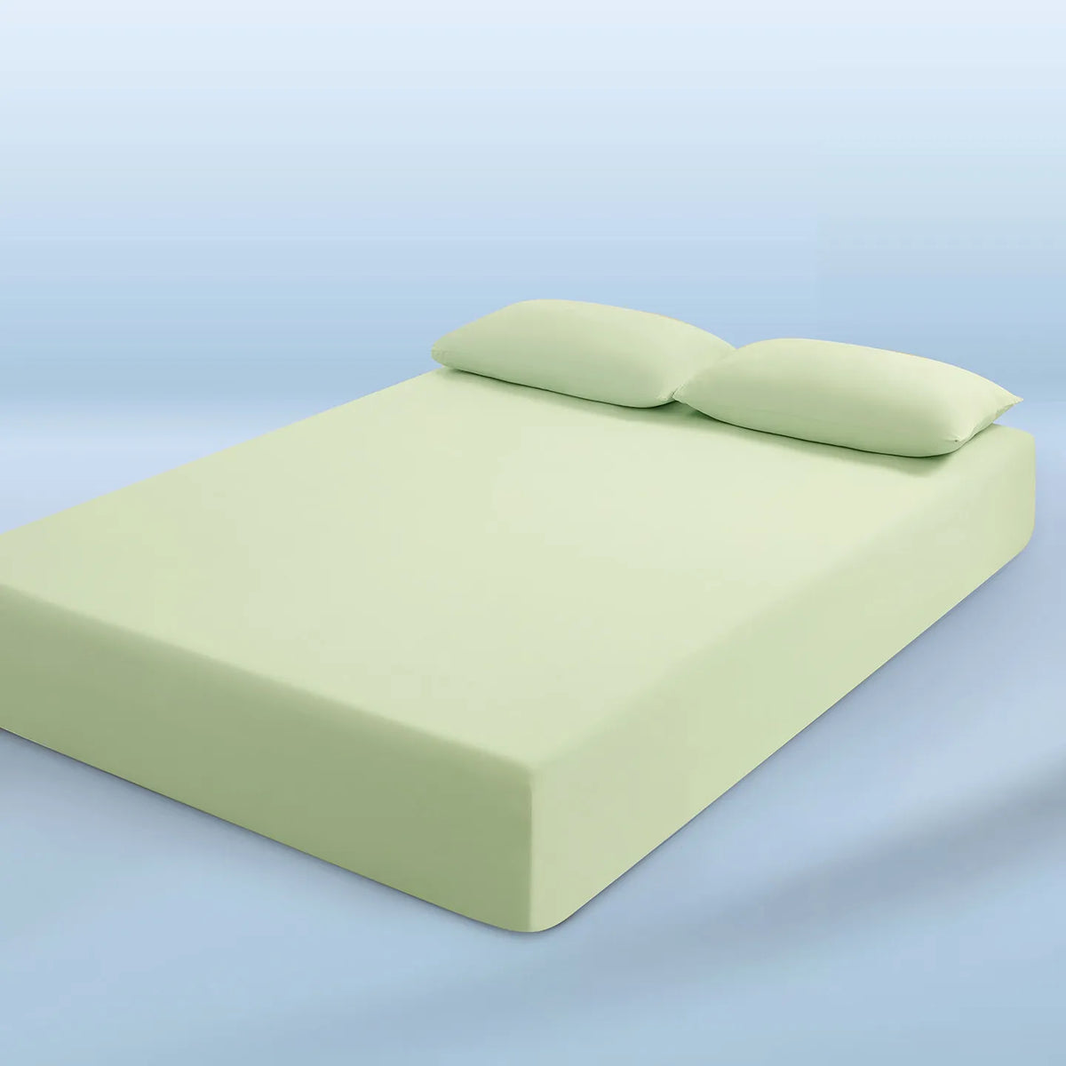 parure lit bleu clair drap housse élastique deux oreillers coton doux chambre moderne