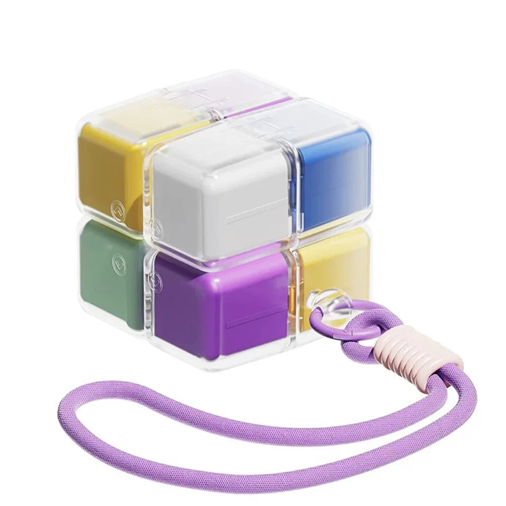 cube rangement médicaments violet blanc vert jaune moderne compartiments cordelette portable organisation