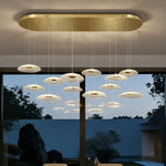 suspension lumineuse contemporaine transparente dorée ajourée salon restaurant led 4000k 3000k 6000k