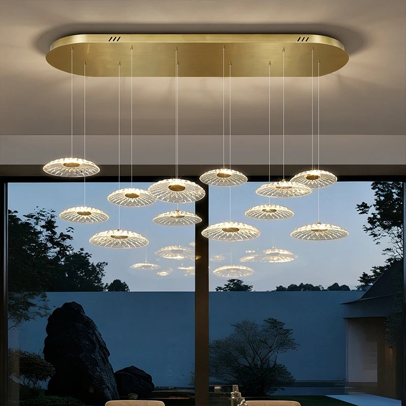 suspension lumineuse contemporaine transparente dorée ajourée salon restaurant led 4000k 3000k 6000k