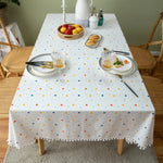 nappe table blanche moderne points multicolores bordure pompons extérieur intérieur mariage festivité geometrique