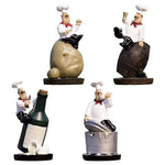 statue cuisinier cartoon uniforme blanc tablier noir chapeau cuillère dorée bouteille pot pomme terre
