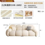canapé moderne beige corduroy coussins décoratifs bois minimaliste salon maison