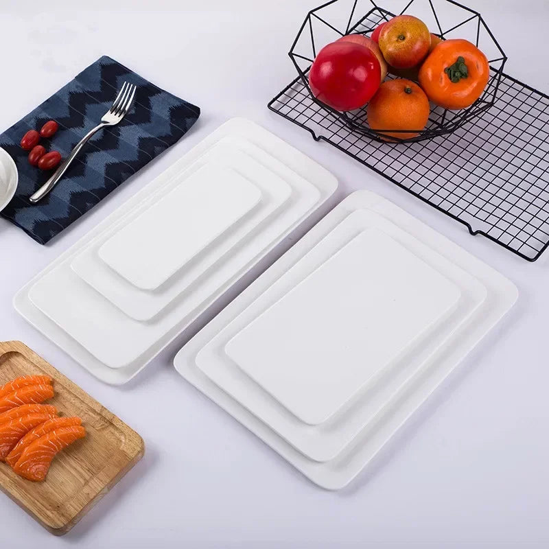 assiettes plats modernes blanc noir cuisine rangement fruits desserts petit déjeuner