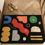 Un tapis décoratif avec des formes géométriques colorées et des expressions, créant une atmosphère joyeuse et ludique dans l'entrée.