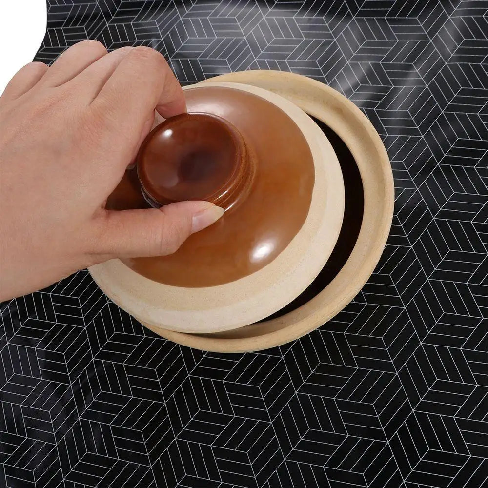 tapis protection plaque cuisson induction noir motif géométrique blanc anti dérapant moderne adhésif résistant