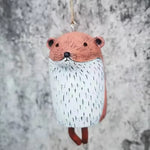cloches décoratives animaux ours renard hibou motifs poils plumes artisanal extérieur