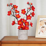 décoration intérieure branche artificielle fleurs simples couleur rouge blanc rose jaune naturel minimaliste