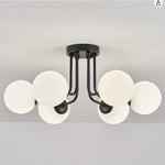 luminaire moderne or noir globes verre opaques semi suspendus métal