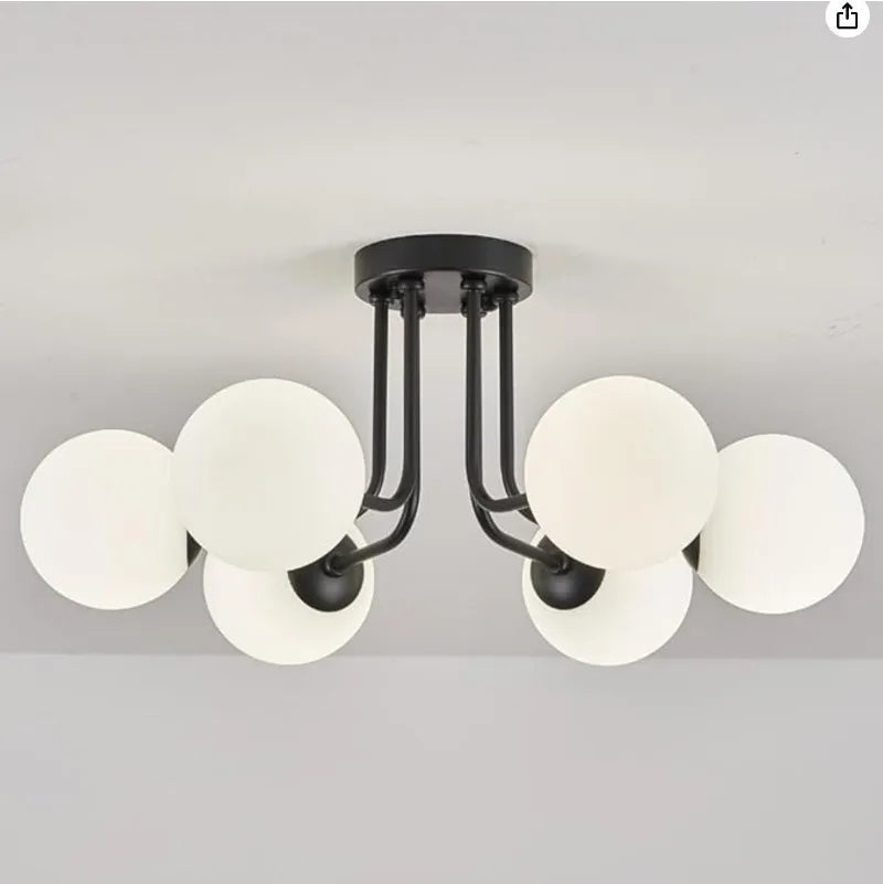 luminaire moderne or noir globes verre opaques semi suspendus métal