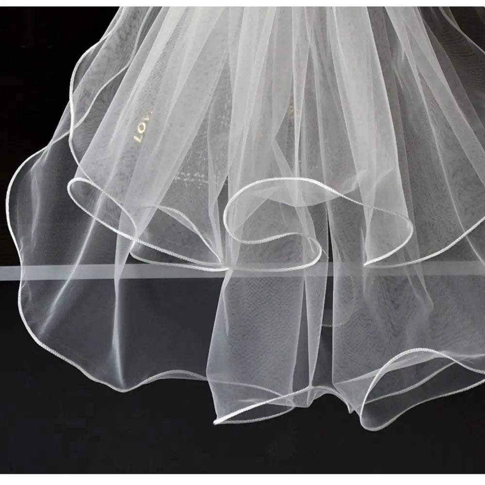 voile mariée blanc translucide détails floraux classique clips inclusion élégant