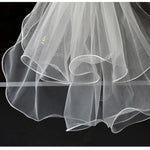 voile mariée blanc translucide détails floraux classique clips inclusion élégant
