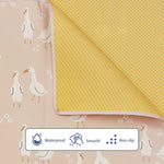 tapis anti dérapant enfant motif canards beige jaune texture pointillée moderne pliable activité jeu