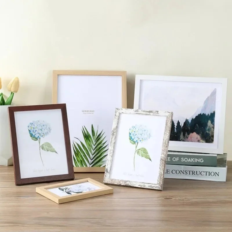 cadres photo bois clair marron modernes minimalistes suspensions posées impressions florales