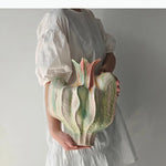 vase céramique texturé rose vert orange stries verticales tulipes allium décoration table moderne sculptural