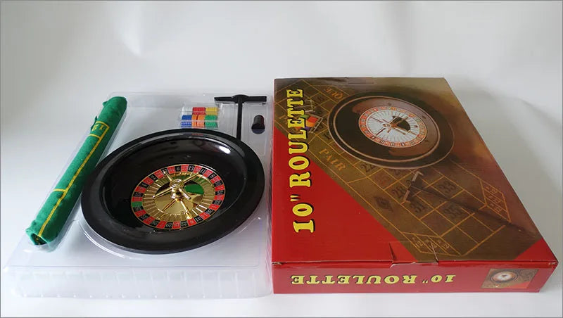 jeu roulette miniature tapis vert jetons colorés numéros dorés compartiments noirs pelle inclusion casino