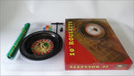 jeu roulette miniature tapis vert jetons colorés numéros dorés compartiments noirs pelle inclusion casino