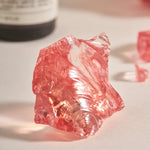 pierres quartz rose flacon parfum or argent élégant décor photo fond background prop transparent