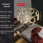 suspension lumineuse moderne or anneaux pendentif led table chambre salon restaurant lumière maison