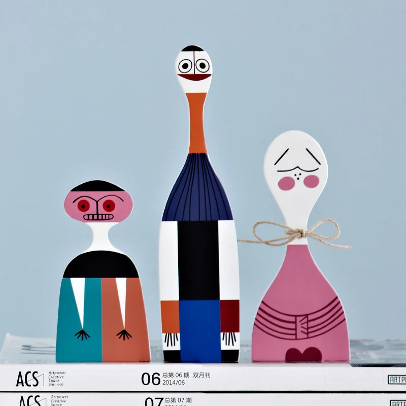 figurines decoratives modernes abstraites geometriques blanc noir rouge bleu gris beige triangles lignes noel