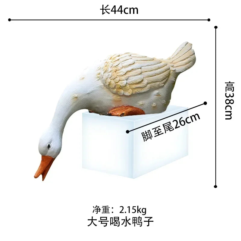 statue canard blanc plumes orange piscine jardin décoration extérieure animaux ornements paysagistes fleurs artificielles