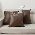 taies d'oreiller modernes cuir pu marron uni brillant 30x50cm 45x45cm 50x50cm opaques chambre salon