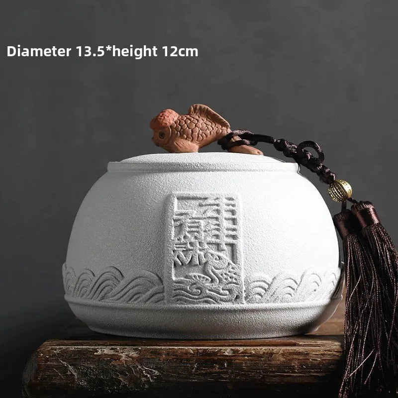 pot thé rouge jaune noir artisanal motifs floraux poisson chaîne pompon hermétique
