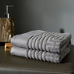 serviette coton absorbante lavable machine motif géométrique gris classique douce utilisation quotidienne