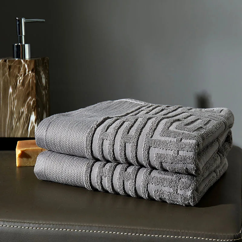 serviette coton absorbante lavable machine motif géométrique gris classique douce utilisation quotidienne