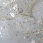 tissu dentelle feuilles brodé élégant polyester translucide blanc argent materiaux couture robes mariage