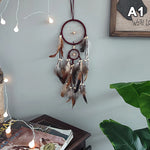décoration intérieure attrape rêves traditionnel plumes naturelles fil coton noir bleu beige