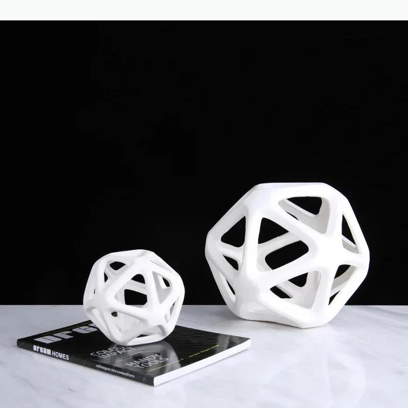 décoration intérieure moderne sculpture sphérique géométrique blanc noir doré structure ouverte