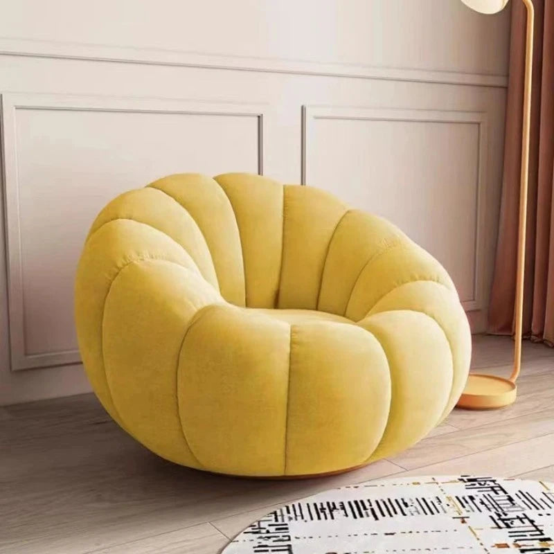 fauteuil moderne velours bouclé doux repos pieds beige clair intérieur meubles salon contemporain