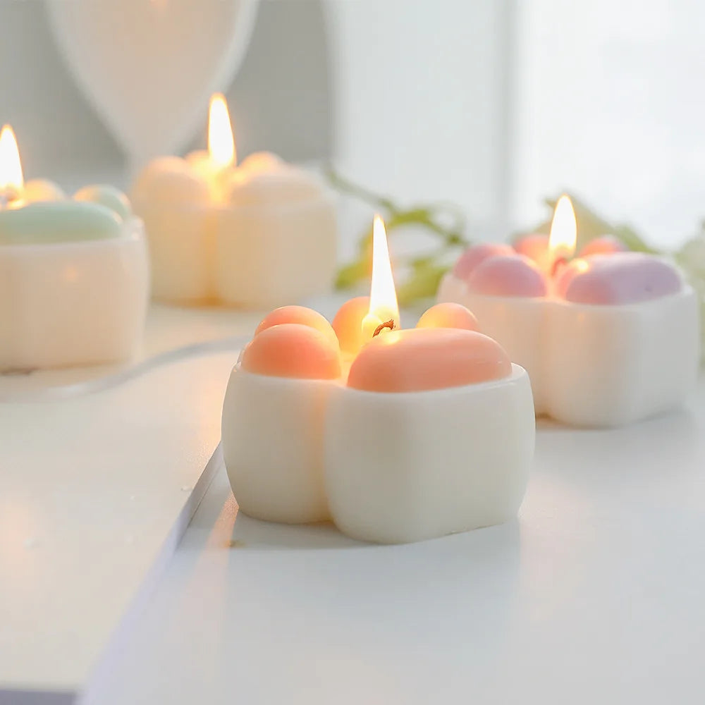 bougies parfumées patte chat blanc rose bleu jaune aromathérapie créatif modernes tringle save date