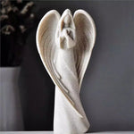 statue ange pierreuse détails sculptés texture grès décoration intérieure extérieure élégante moderne spirite beige