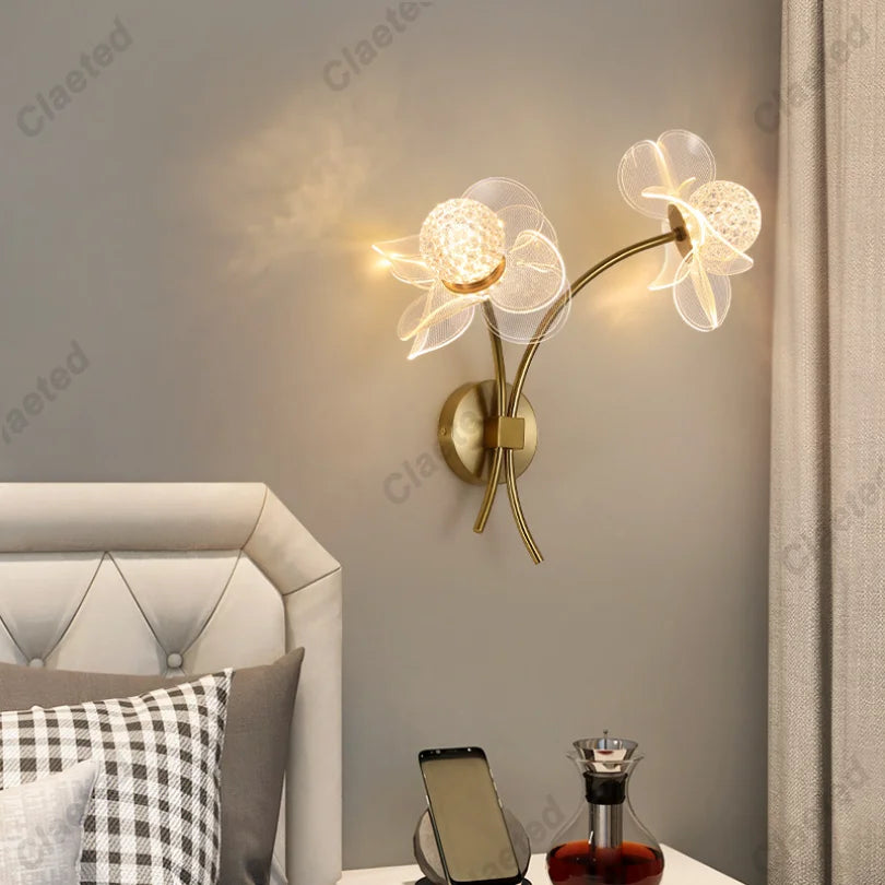 Détail de l'applique murale fleur en fer et acrylique avec éclairage LED