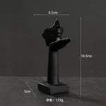 statuettes décoratives visage humain noir blanc doré modernes minimalistes abstraites contemporaines base carrée livres