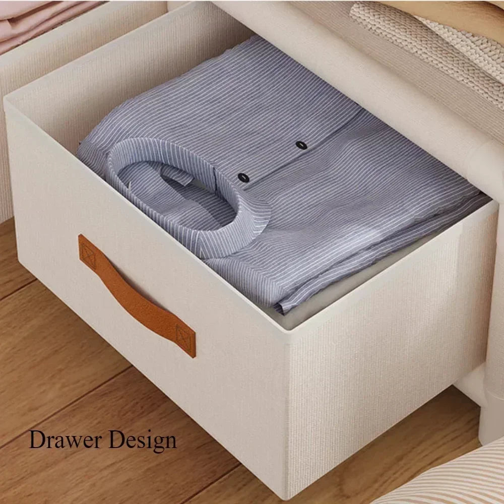 armoire vêtements moderne blanche rangées tiroirs compartiments rideau paires vêtements suspendus panier ours tasse