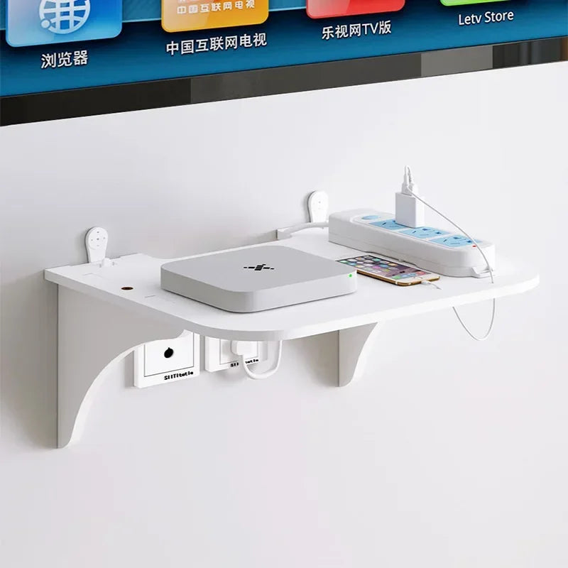 étagère murale blanche moderne prise électrique adhésive télécommandes routeur chargeurs minimaliste suspension