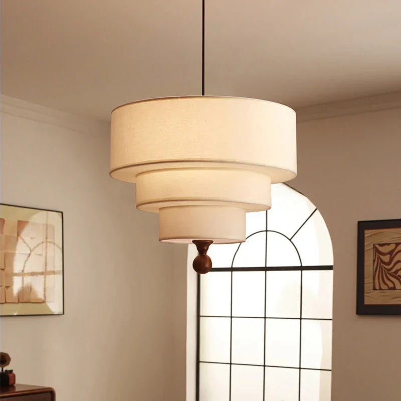 suspension lumineuse moderne trois abat jours tissu vert olive classique