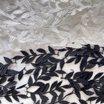 ruban décoratif élégant feuilles stylisées polyester blanc noir soluble eau