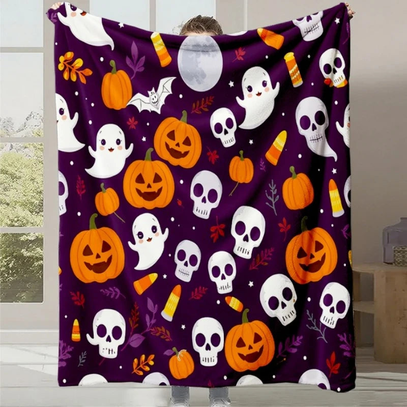 Cette image montre un motif de décoration d'Halloween comprenant des citrouilles, des crânes, des fantômes et d'autres symboles de la fête.