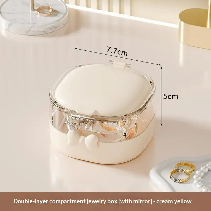 boîte bijoux moderne violet clair compartiments strass poignée élégante rose pâle beige clair